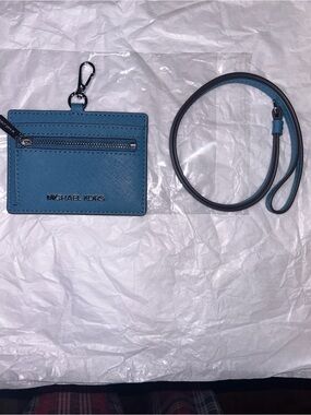 Micheal Kors card /Id holder,has zip pocket, clips onto bag,or lanyard NWOT
